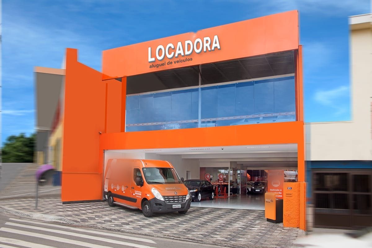Loja de locadora de veículos com van na entrada